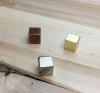 The Game Crafter - Board Game Pieces - 8mm metal cubes in gold, silver, and bronze colors.